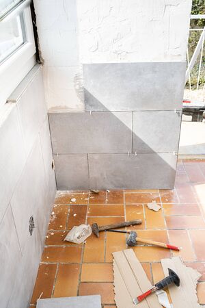 ceramic tile installation site with its toolsの写真素材