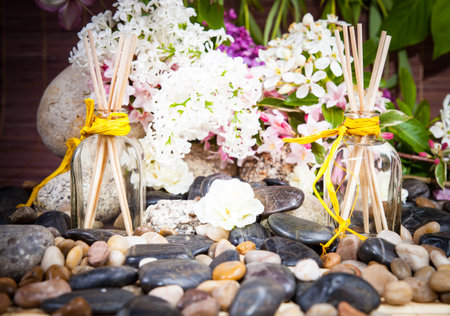 Aromatherapy, spa, beauty treatment and wellness background with massage stone, flowers, balcon .. spa conceptの写真素材