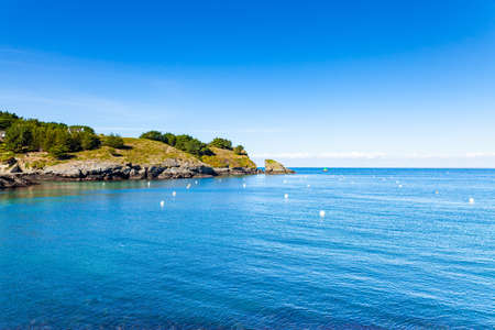seascape at the entrance of the port of Sauzon on the Island of Belle Ile en Mer in the Morbihanの写真素材