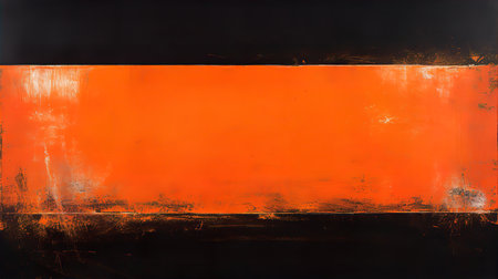 Orange and black grunge background with space for text or image.の素材