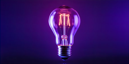 Incandescent Light Bulb Filament Element Energy Glow Purple Backgroundの素材