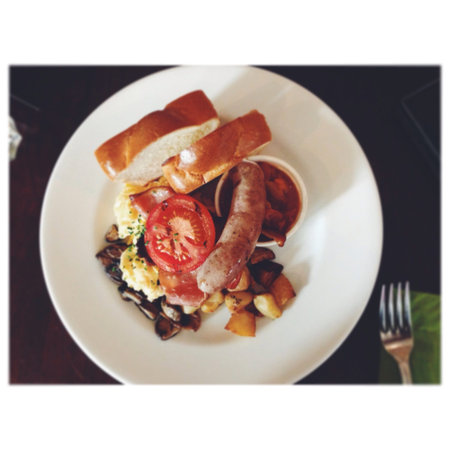 grilled sausage served with toast bread and grilled mushrooms