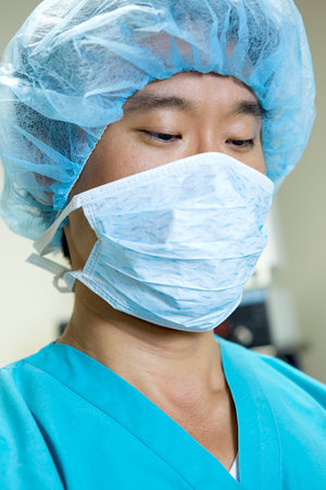 An Asian Doctor Working in a Hospitalの写真素材