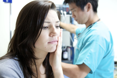 A patient visit with a doctor at a hospitalの写真素材