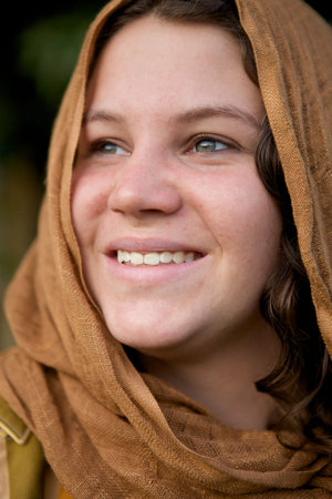 A Beautiful Girl with a cloth hood and green eyes