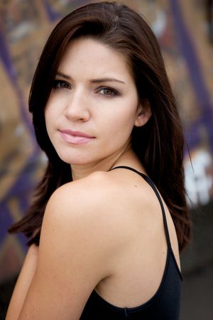 Beautiful Brunette with an edge and darker eye makeupA Sexy Brunette Looking Toward The Camera with an edgy lookの写真素材