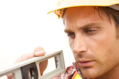 A Construction Worker on the job with a hard hatの写真素材