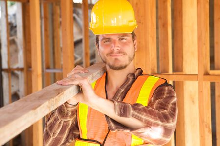 A Construction Worker on the job with a hard hatの写真素材