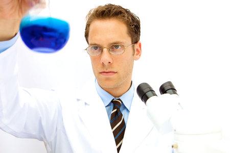A male scientist working in a lab with glassesの写真素材