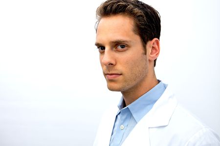 A young doctor looking at the cameraの写真素材