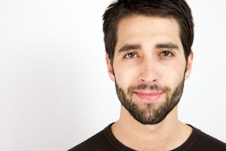A Happy Young Man looking at the camera 