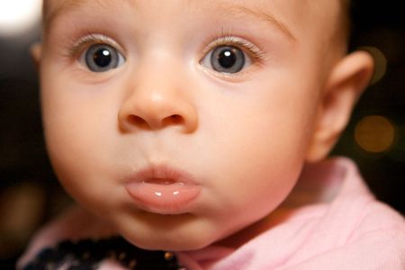 A Funny Little Girl Making Cute Faceの写真素材