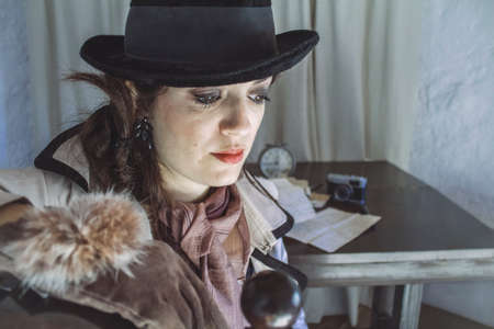 Woman detective in officeの写真素材