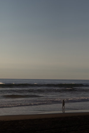 A sunset over a body of water, Pichilemu, Chile, outdoorの写真素材