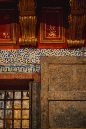 A close up view of a brown wooden door on a buildingの写真素材