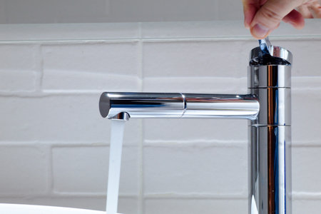 wasting water flow coming out of tap in new bathroom