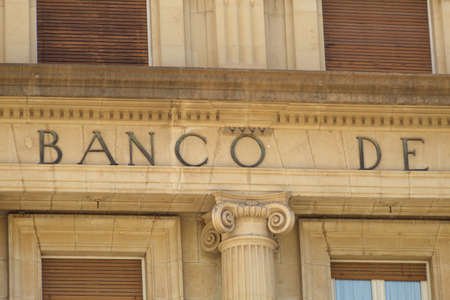 Facade of a bank building where money is tradedの写真素材
