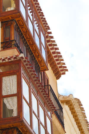 Beautiful wooden balconies of houses in small towns in AlmerÃ­aの写真素材