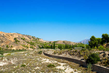 Beautiful landscape of mountains and trees in a protected natural environmentの写真素材