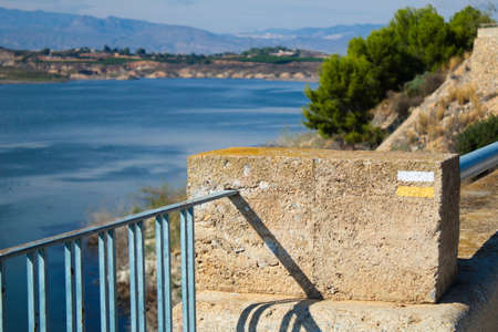 Nice panoramic view of the Santomera reservoir on a sunny dayの写真素材