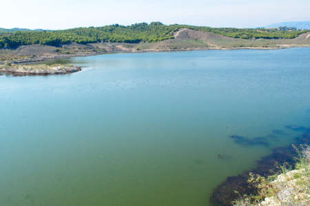 Nice panoramic view of the Santomera reservoir on a sunny dayの写真素材