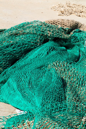 Colorful fishing nets ready to be shipped and used at seaの写真素材