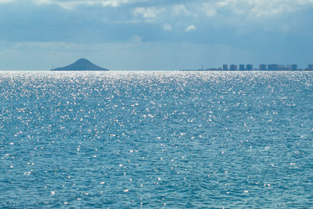 Nice seascape with boats going through the surf in vacation time