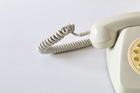 Old analog disk phone for obsolete communicationsの写真素材