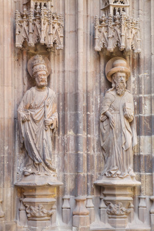 Sculptures of the apostles Santiago and Pedro on the gothic facade of the cathedral of Murcia