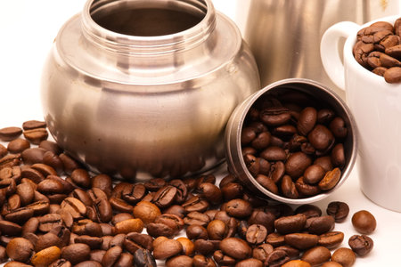 Close-up of coffee beans on white background