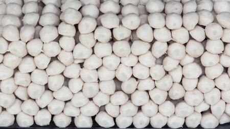 Stack of pork meat ball in market, Thailandの写真素材
