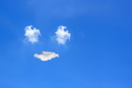 Smile from cloud in the blue skyの写真素材