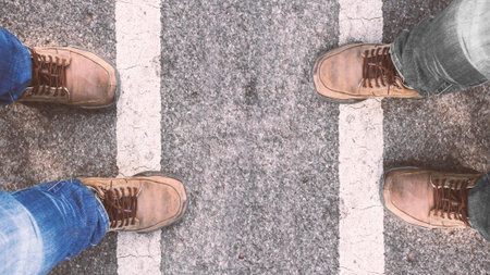 Men standing on the streetの写真素材