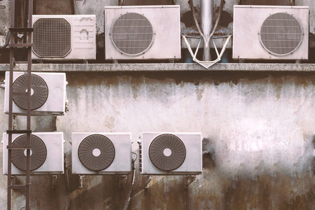 Air conditioning system assembled on a wall of building.の写真素材