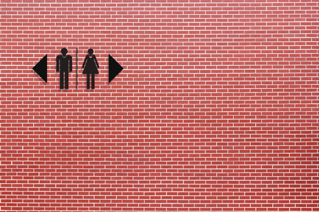 Toilet sign on red brick wallの写真素材