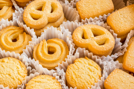 Big box of butter cookies with suggar,c ookies in box.
