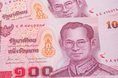 close up of thai money 100 baht on background