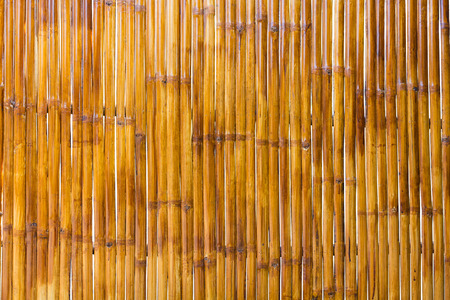 Brown bamboo wall, old bamboo texture background.の写真素材