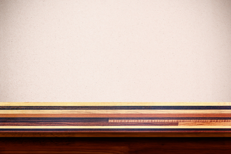 Empty wooden table with plywood wall background. For display or montage your products.の写真素材