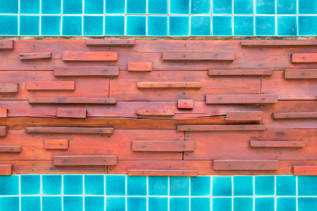 Old wood and color mosaic texture background.の写真素材