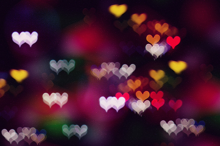 Colorful heart bokeh watercolor background on paper texture for Valentine's day.の写真素材