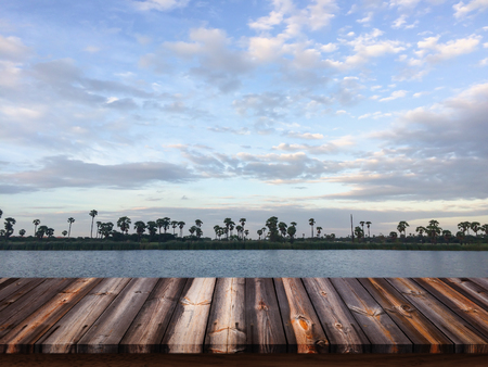 Empty wood table with view of landscape background.の写真素材