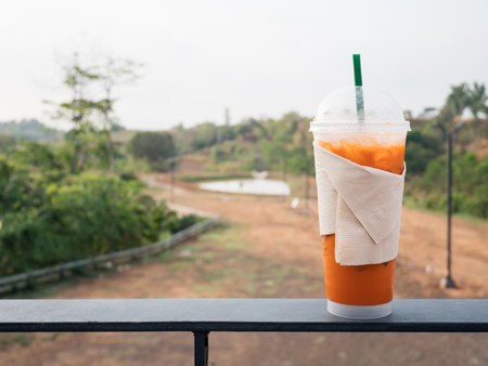 Milk tea with abstract blur nature background.の写真素材