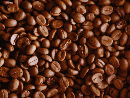 Closeup of brown coffee beans background.の写真素材