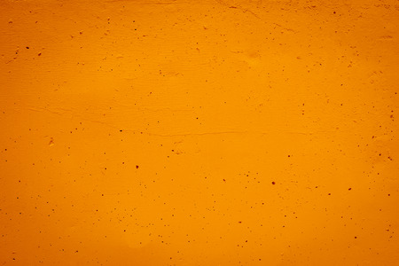 Orange concrete wall texture and background for design pattern artwork.の写真素材