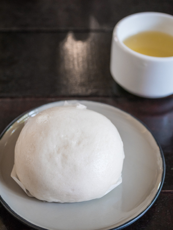 close up Chinese Steamed bun on a plateの写真素材