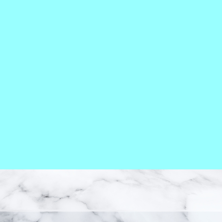 White marble table on light blue background. For display or montage your products.の写真素材