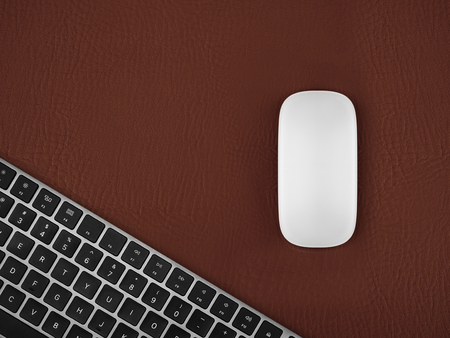 Top view of white computer mouse and keyboard on a red mouse pad texture background.の写真素材