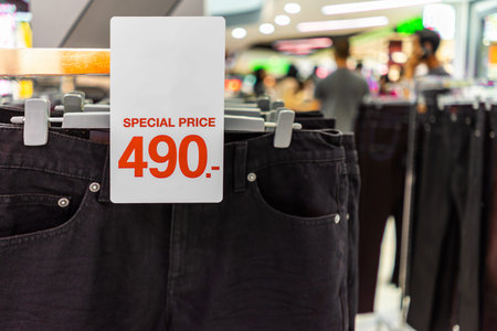 Discount sale sign in shopping mall background.