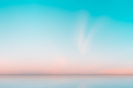 Beautiful sky before sunrise on sea background. Natural gradient of orange and blue sky.